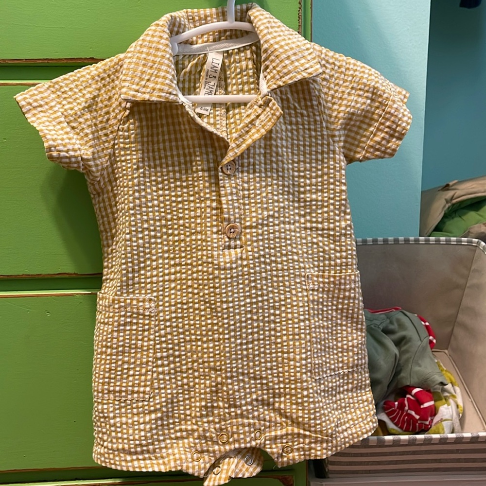 Unisex baby romper.